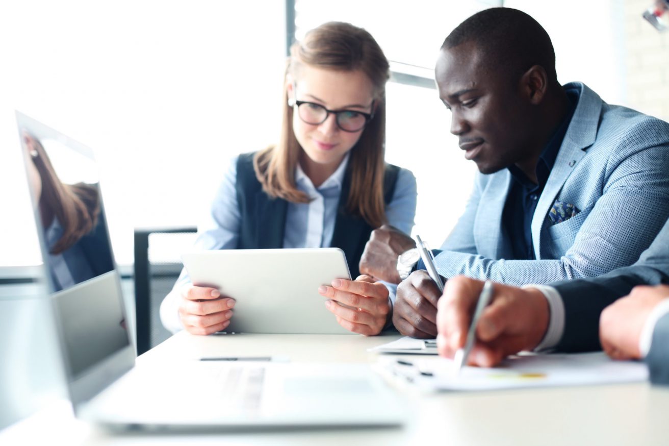 Business people analyze IT product lifecycle